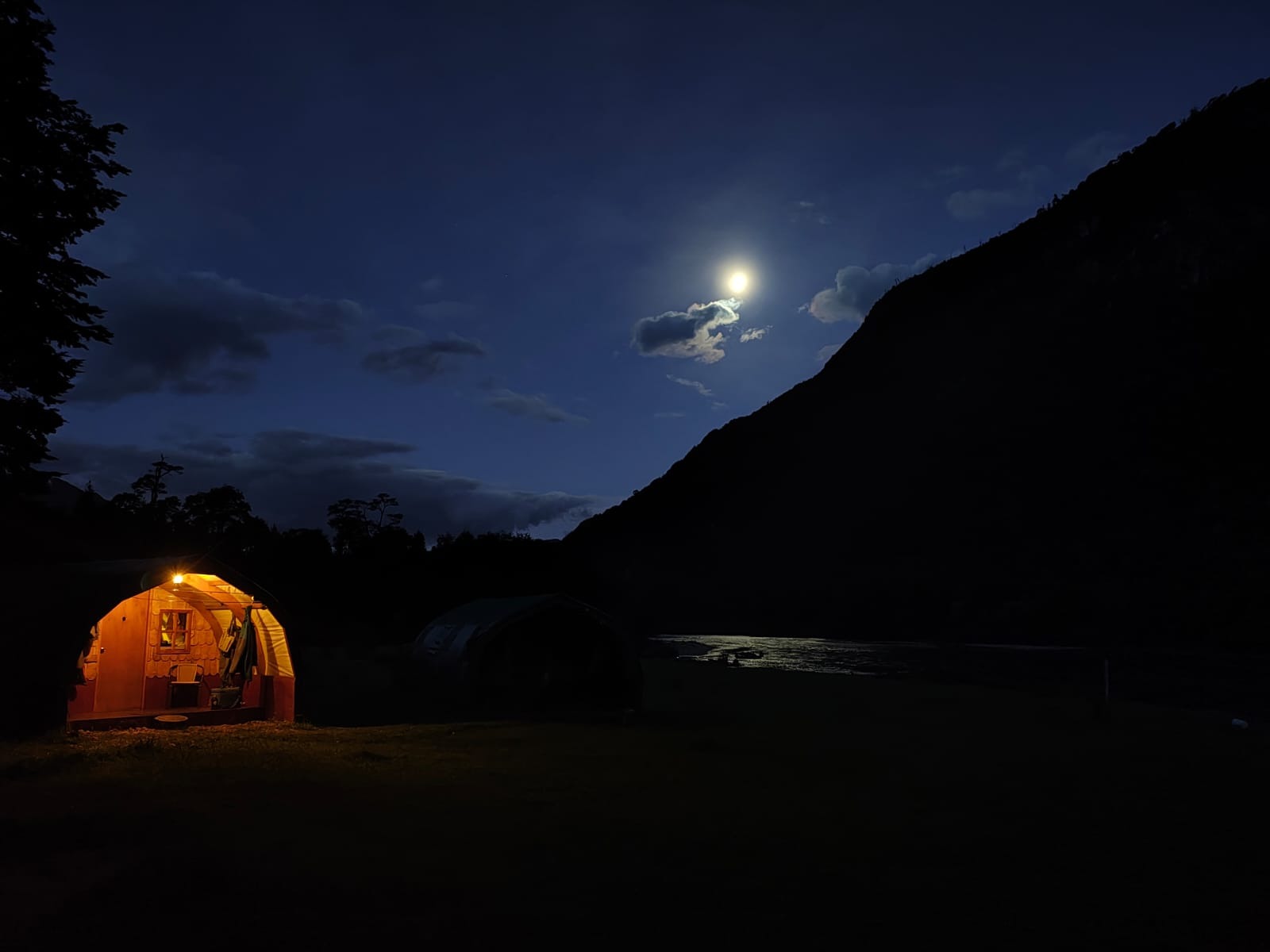 Moon over River of Dreams Basecamp — night on the Río Blanco, Chilean Patagonia
